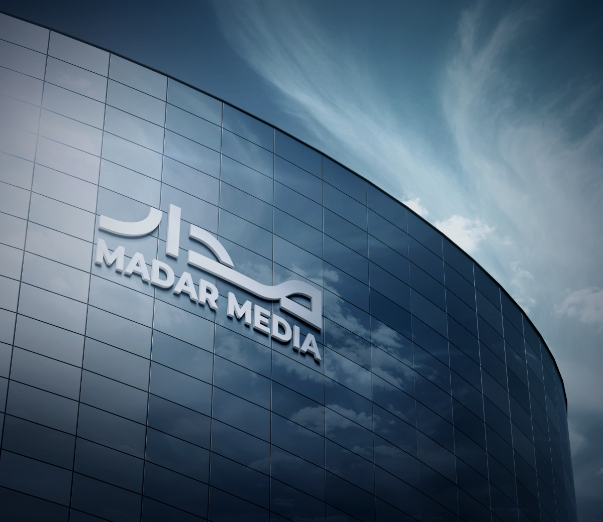 Madar Media logo on a glass facade